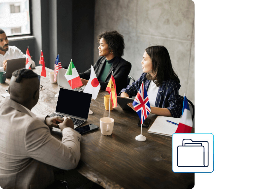 A diverse group of professionals sit around a conference table with international flags, symbolizing multilingual collaboration and global communication via AI Dubbing.